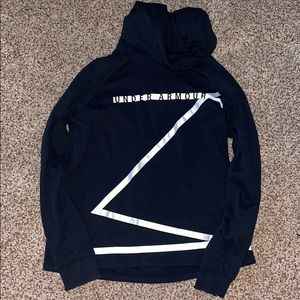 Black and white UNDER ARMOUR pullover sweatshirt.